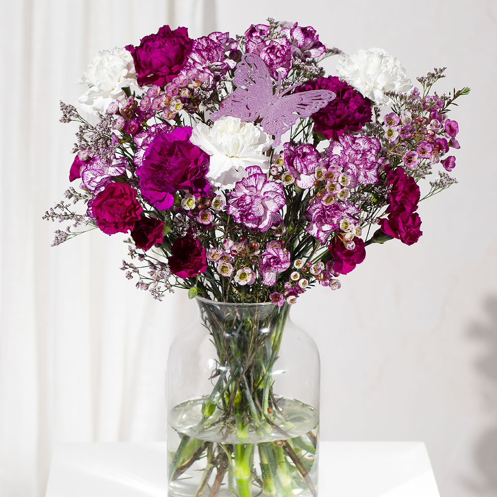 Bunches Butterfly Dreams letterbox flower bouquet with pink and purple carnations