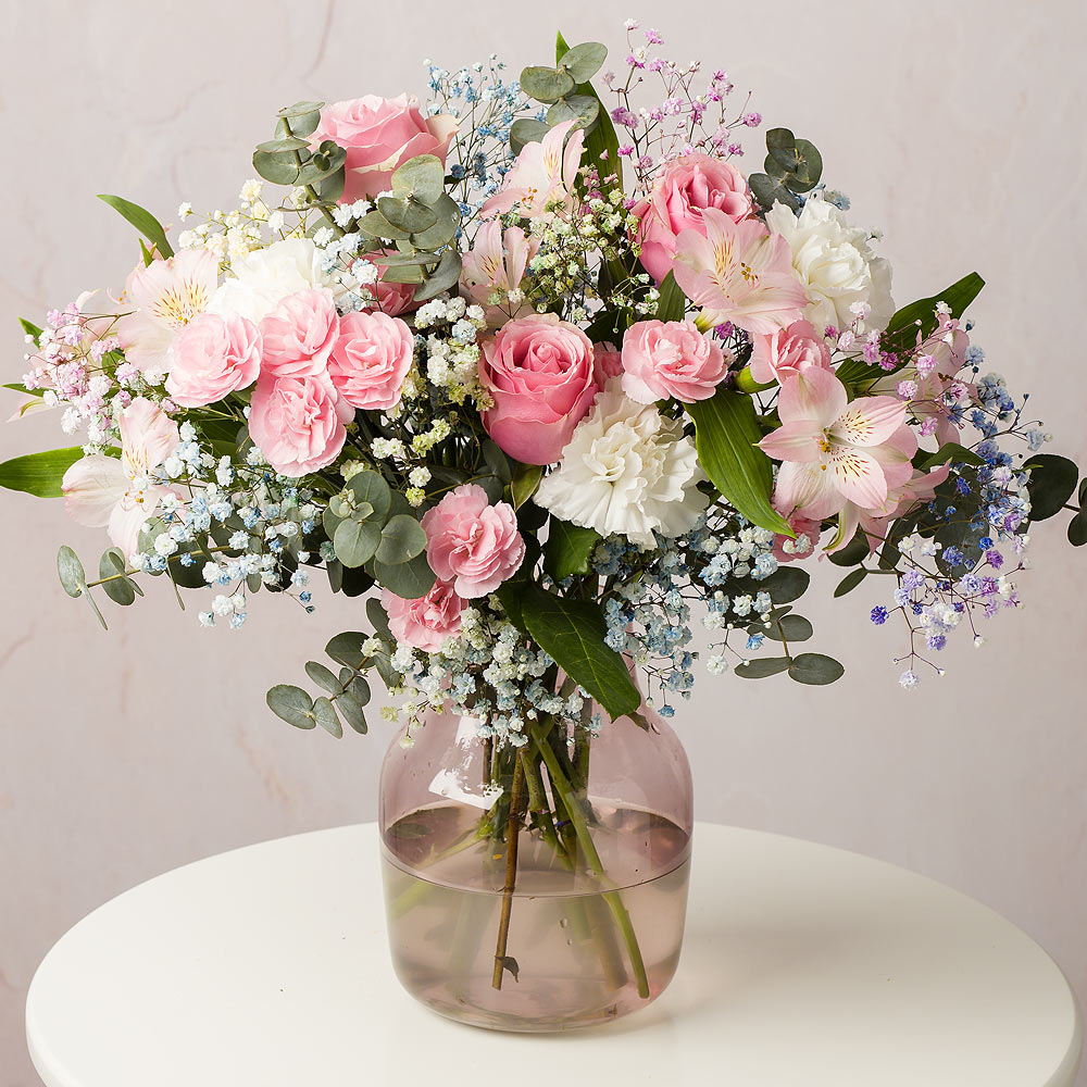 Bunches Rainbow Galaxy hand-tied bouquet with pink roses and rainbow gypsophila
